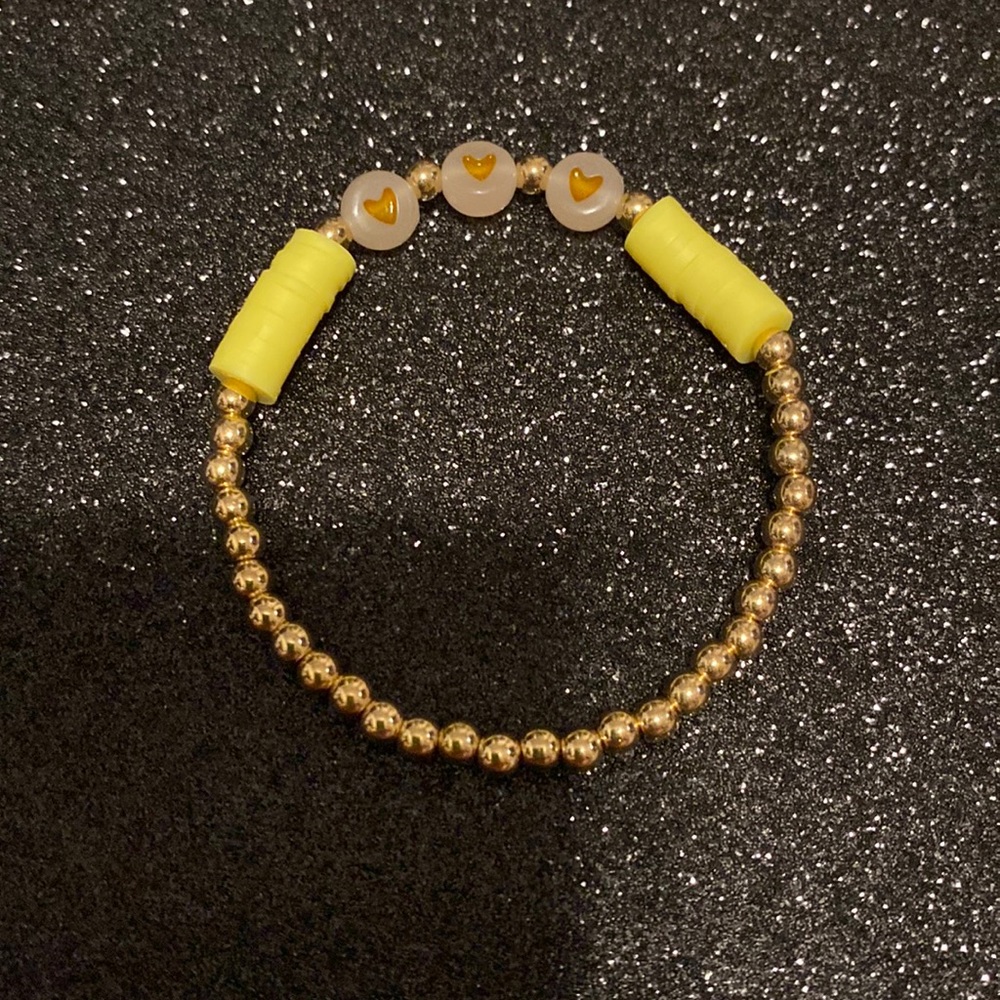 Girls faux hood beaded yellow heart stretch glow in the dark bracelet